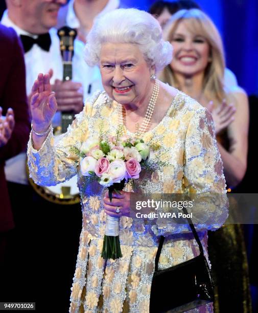 Queen Elizabeth II acknowledges the audience after a speech by Prince Charles, Prince of Wales at the end of a star-studded concert to celebrate the...