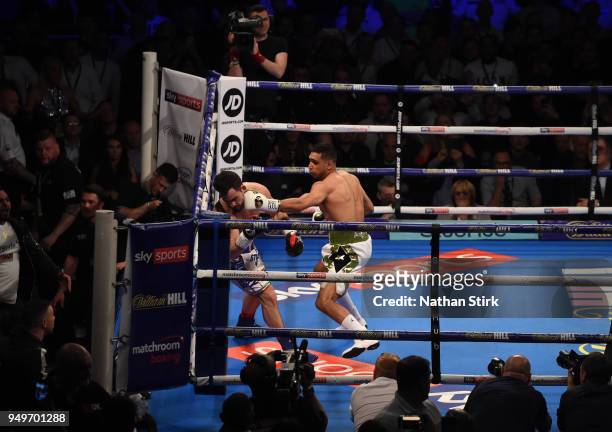 Amir Khan knocks out Phil Lo Greco during their welterweight title fight at Echo Arena on April 21, 2018 in Liverpool, England.