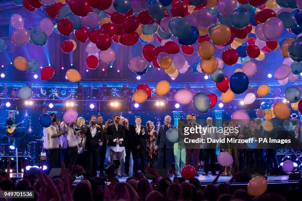 Sir Tom Jones and other performers on stage at the Royal Albert Hall in London during a star-studded concert to celebrate the Queen's 92nd birthday.