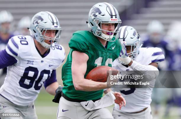 Kansas State quarterback Skylar Thompson scrambles for yardage during the annual Spring Game at K-State in Manhattan, Kan., on Saturday, April 21,...