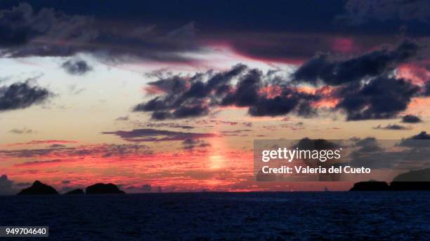 twilight and clouds - valeria del cueto stock pictures, royalty-free photos & images