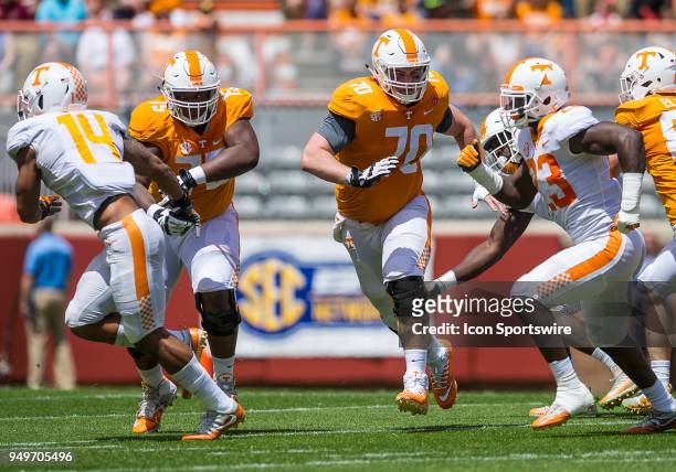 Tennessee Volunteers offensive lineman Jerome Carvin and offensive lineman Ryan Johnson blocking during the Tennessee spring game on April 21 at...