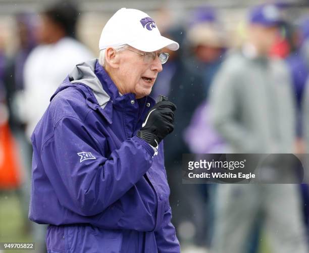 Kansas State head coach Bill Snyder takes notes on his handheld recorder during the annual Spring Game at K-State in Manhattan, Kan., on Saturday,...