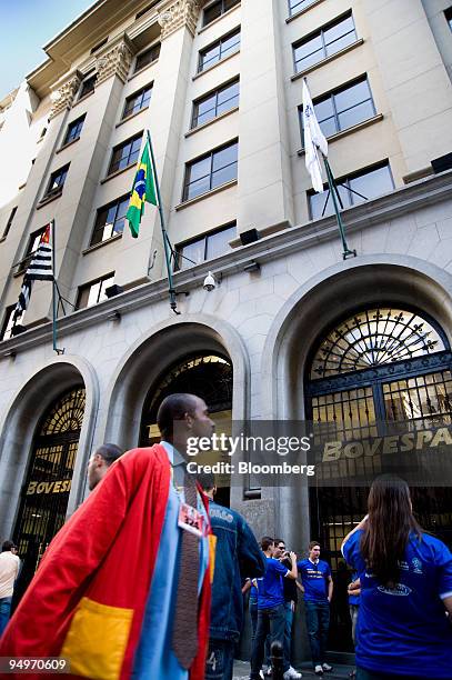 Trader walks past the Bolsa De Valores De Sao Paulo, or Sao Paulo Stock Exchange , building in Sao Paulo, Brazil, on Thursday, May 21, 2009....