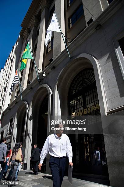 Pedestrians walk past the Bolsa De Valores De Sao Paulo, or Sao Paulo Stock Exchange , building in Sao Paulo, Brazil, on Thursday, May 21, 2009....