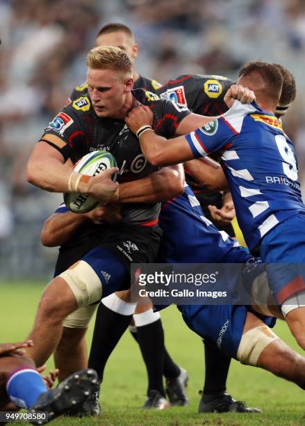 Jean-Luc du Preez of the Cell C Sharks holds off Dewaldt Duvenage of The DHL Stormers during the Super Rugby match between Cell C Sharks and DHL...