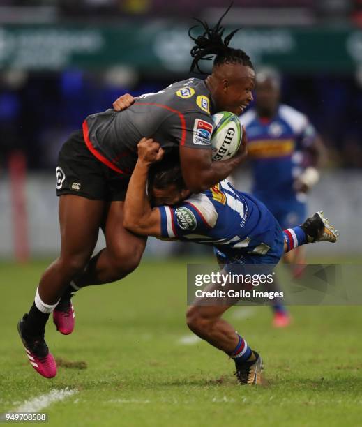 SÕbusiso Nkosi of the Cell C Sharks tackled by Dillyn Leyds of The DHL Stormers during the Super Rugby match between Cell C Sharks and DHL Stormers...