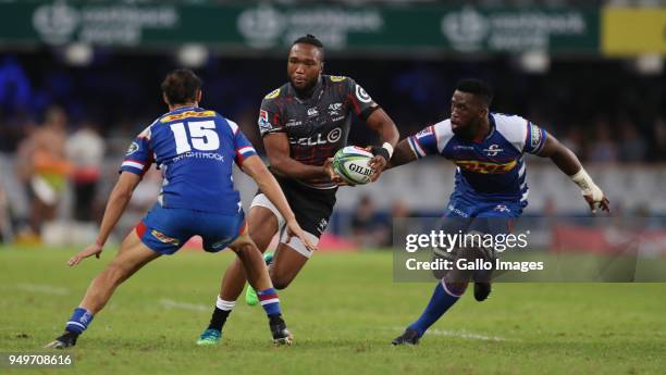 Dillyn Leyds of The DHL Stormers looks to tackle Lukhanyo Am of the Cell C Sharks during the Super Rugby match between Cell C Sharks and DHL Stormers...