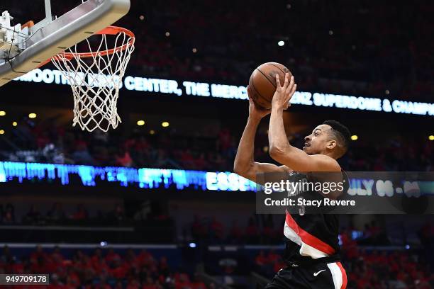 McCollum of the Portland Trail Blazers takes a shot against the New Orleans Pelicans during the first half of Game Four of the first round of the...
