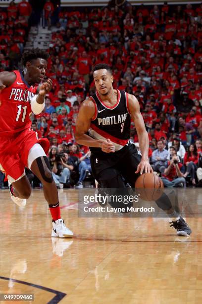 McCollum of the Portland Trail Blazers handles the ball against the New Orleans Pelicans in Game Four of Round One of the 2018 NBA Playoffs on April...