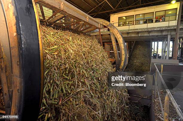 Sugar cane is unloaded from a bin at Bundaberg Sugar's Millaquin Mill in Bundaberg, Queensland, Australia, on Friday, Aug. 14, 2009. The 86 percent...