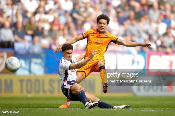 Helder Costa of Wolverhampton Wanders shoots at goal ahead of Anthony Robinson of Bolton Wanderers during the Sky Bet Championship match between...