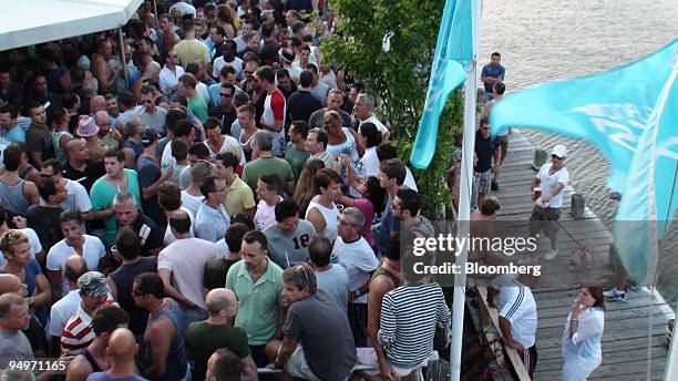 Crowd of drinkers gathers for 'Low Tea' at the Blue Whale in Fire Island Pines in Fire Island, New York, U.S., on July 25, 2009. The Pines is a...