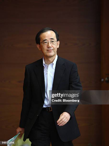 Masaaki Shirakawa, governor of the Bank of Japan, arrives for a news conference in Tokyo, Japan, on Tuesday, Aug. 11, 2009. The Bank of Japan said it...