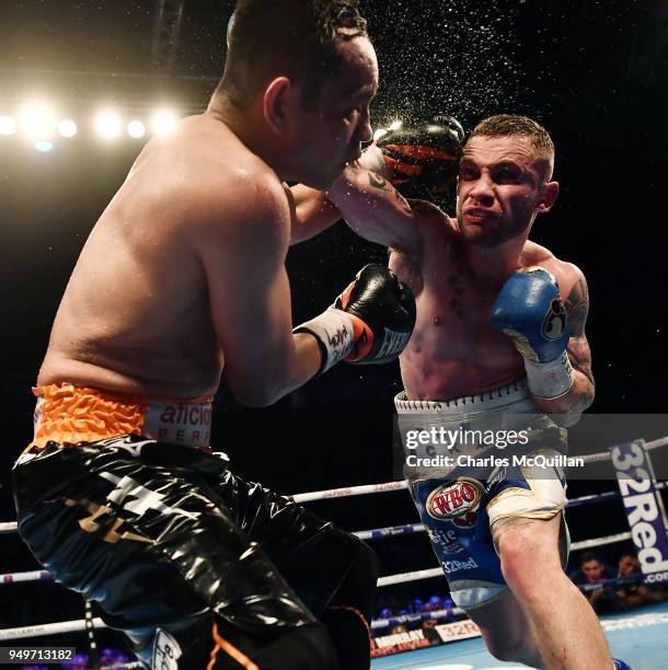 Carl Frampton and Nonito Donaire during their WBO Interim World Featherweight championship bout at SSE Arena Belfast on April 21, 2018 in Belfast,...