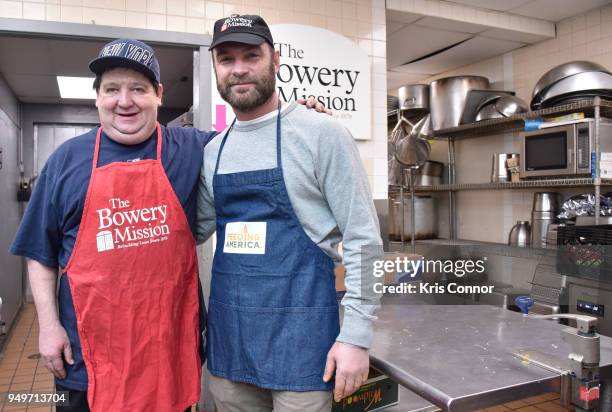 Actor Liev Schreiber volunteers with Chef John Gaspat and Feeding America at The Bowery Mission on April 21, 2018 in New York City.