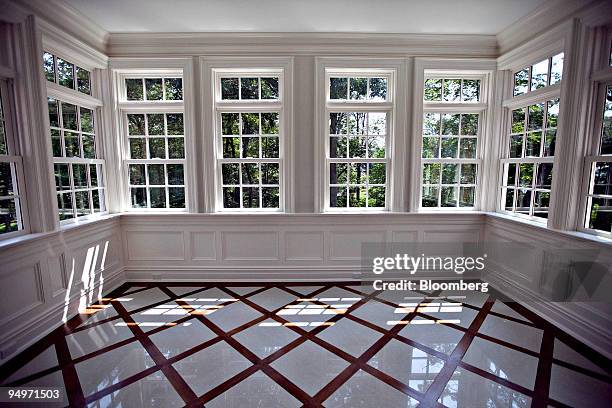 Wood and marble cover the floor of a private sunroom in the master suite of a spec home at 38 French Road, in Greenwich, Connecticut, U.S., on...