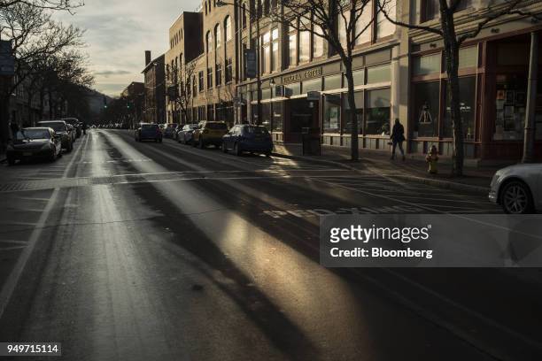 Pedestrian walks on Market Street in the historic district of Corning, New York, U.S., on Monday, March 27, 2017. The Corning Inc., a manufacture of...