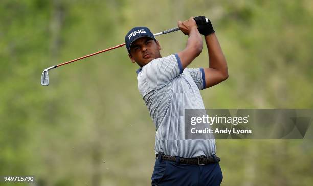 Sebastian Munoz of Columbia hits his second shot on the 14th hole during the third round of the North Mississippi Classic on April 21, 2018 in...