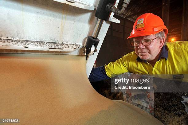 Bundaberg Sugar refinery employee Bill Betheras monitors raw sugar production at the refinery in Bundaberg, Queensland, Australia, on Friday, Aug....