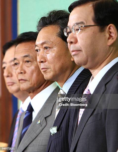 From left to right: Akihiro Ohta, representative of the New Komeito Party of Japan, Taro Aso, Japan's prime minister and president of the Liberal...