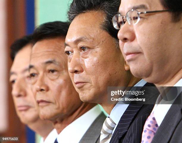 From left to right: Akihiro Ohta, representative of the New Komeito Party of Japan, Taro Aso, Japan's prime minister and president of the Liberal...