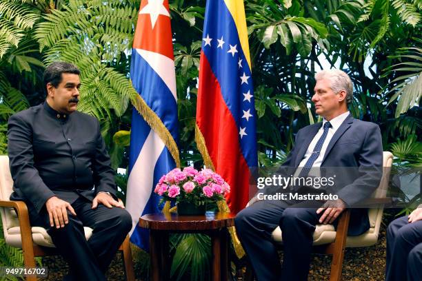 President of Venezuela Nicolas Maduro talks with President of Cuba Miguel Díaz-Canel during his official visit to Cuba on April 21, 2018 in Havana,...