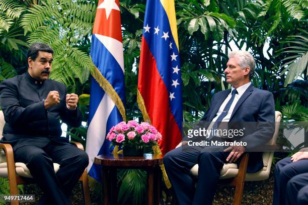 President of Venezuela Nicolas Maduro talks with President of Cuba Miguel Díaz-Canel during his official visit to Cuba on April 21, 2018 in Havana,...