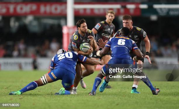 Nizaam Carr of The DHL Stormers looking to tackle Marius Louw of the Cell C Sharks during the Super Rugby match between Cell C Sharks and DHL...
