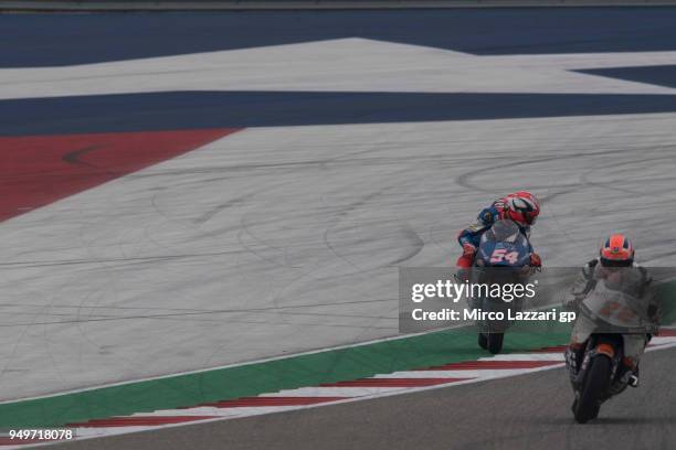 Sam Lowes of Great Britain and Swiss Innovative Investors leads Mattia Pasini of Italy and Italtrans Racing during the Moto2 qualifying practice...