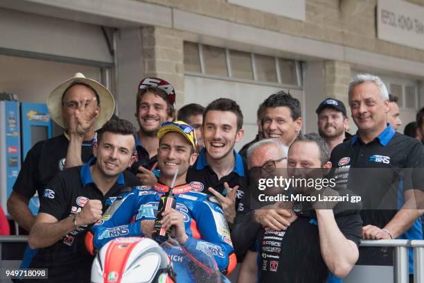 Mattia Pasini of Italy and Italtrans Racing celebrates with team the third place in Moto2 at the end of the qualifying practice during the MotoGp Red...