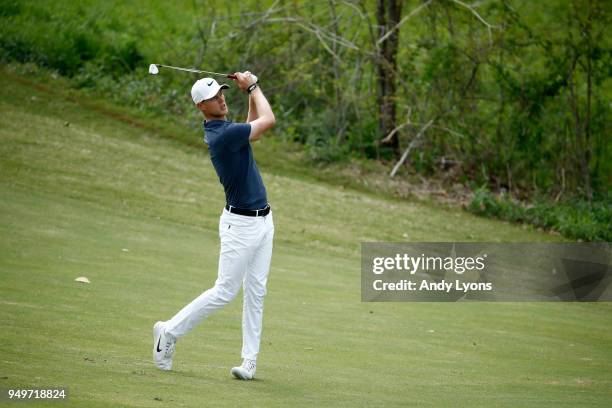 Cameron Davis of Australia hits his second shot on the12th hole during the third round of the North Mississippi Classic on April 21, 2018 in Oxford,...