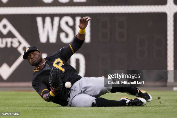 Gregory Polanco of the Pittsburgh Pirates cannot make the catch on a ball hit by Rhys Hoskins of the Philadelphia Phillies in the bottom of the...