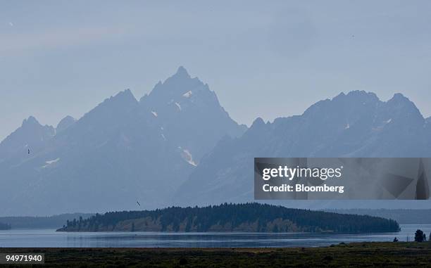 The Teton Range stands in the background of Jackson Lake as seen from the Jackson Lake Lodge in Moran, Wyoming, U.S., on Thursday, Aug. 20, 2009....