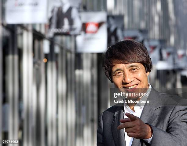 Architect Tadao Ando poses for a photograph in Tokyo, Japan, on Thursday, Aug. 20, 2009. Ando is known for his geometric concrete structures as...