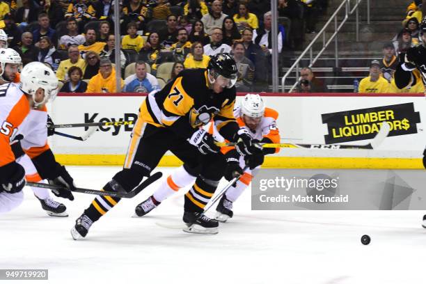 Evgeni Malkin of the Pittsburgh Penguins skates with the puck against the Philadelphia Flyers in Game Five of the Eastern Conference First Round...