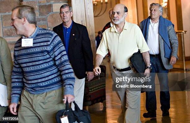 Ben S. Bernanke, chairman of the U.S. Federal Reserve, second from right, and Jean-Claude Trichet, president of the European Central Bank, right,...