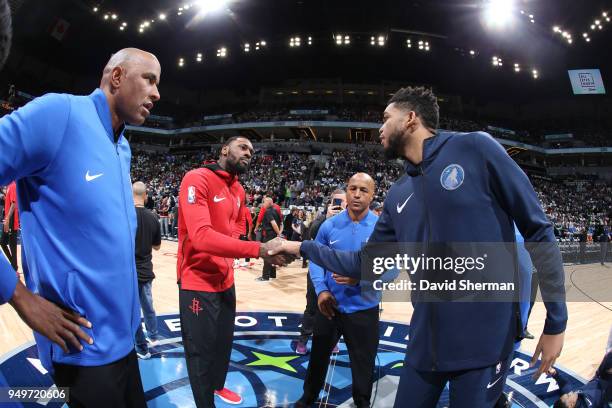 Tarik Black of the Houston Rockets and Karl-Anthony Towns of the Minnesota Timberwolves exchange handshakes to begin Game Three of Round One of the...