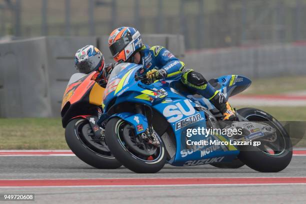 Pol Espargaro of Spain and Red Bull KTM Factory Racing and Alex Rins of Spain and Team Suzuki ECSTAR round the bend during the MotoGp Red Bull U.S....