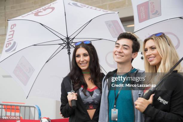The grid girls pose in paddock during the MotoGp Red Bull U.S. Grand Prix of The Americas - Qualifying at Circuit of The Americas on April 21, 2018...