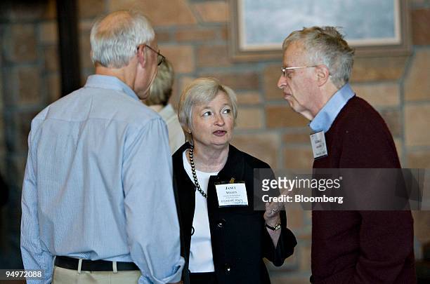 Janet Yellen, president of the Federal Reserve Bank of San Francisco, center, talks with husband George Akerlof, economics professor at the...