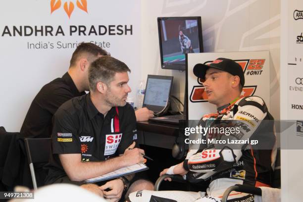 Sam Lowes of Great Britain and Swiss Innovative Investors speaks with mechanics in box during the Moto2 qualifying practice during the MotoGp Red...