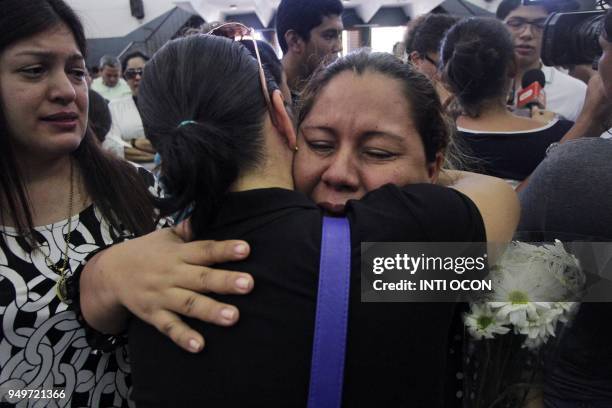 Friends and relatives grieve next to Alvaro Conrado's coffin, a high school student killed during a protest against government's reforms in the...