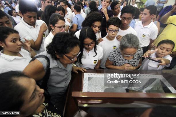 Friends and relatives grieve next to Alvaro Conrado's coffin, a high school student killed during a protest against government's reforms in the...