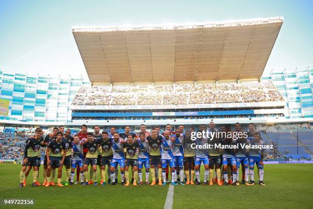 Players of both teams line up prior to the 16th round match between Puebla and America as part of the Torneo Clausura 2018 Liga MX at Cuauhtemoc...