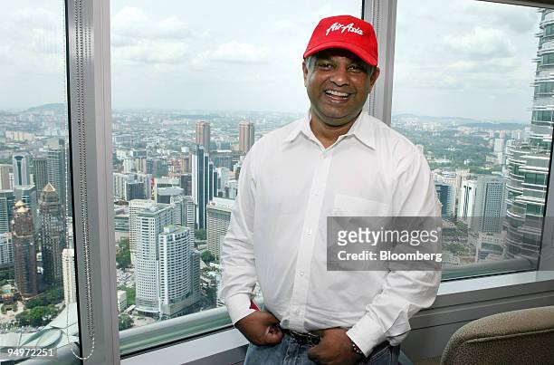 Tony Fernandes, group chief executive officer of AirAsia Bhd., poses for a photograph during an interview in Kuala Lumpur, Malaysia, on Wednesday,...