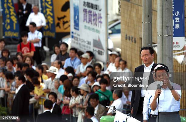 Taro Aso, Japan's prime minister and president of the Liberal Democratic Party , speaks during a campaign rally for the Aug. 30 lower-house election,...