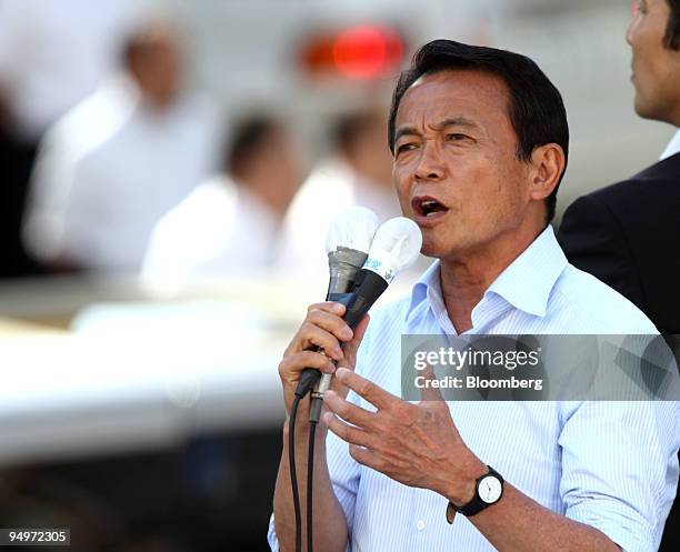 Taro Aso, Japan's prime minister and president of the Liberal Democratic Party , speaks during a campaign rally for the Aug. 30 lower-house election,...