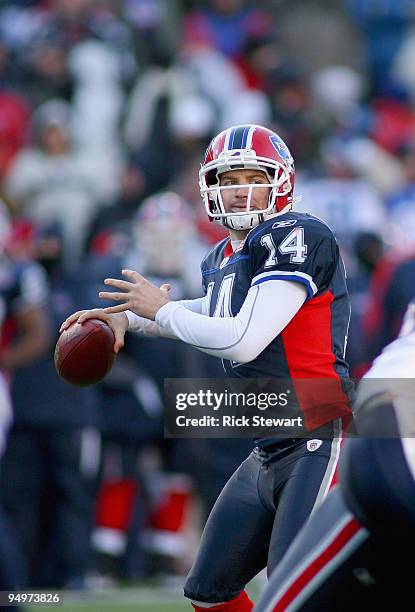 Ryan Fitzpatrick of the Buffalo Bills readies to pass against the New England Patriots at Ralph Wilson Stadium on December 20, 2009 in Orchard Park,...
