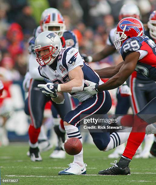 Wes Welker of the New England Patriots can't make a catch on a pass as Drayton Florence of the Buffalo Bills defends at Ralph Wilson Stadium on...